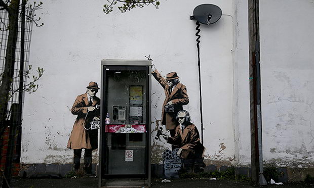 Possible Banksy Artwork Around A Telephone Box