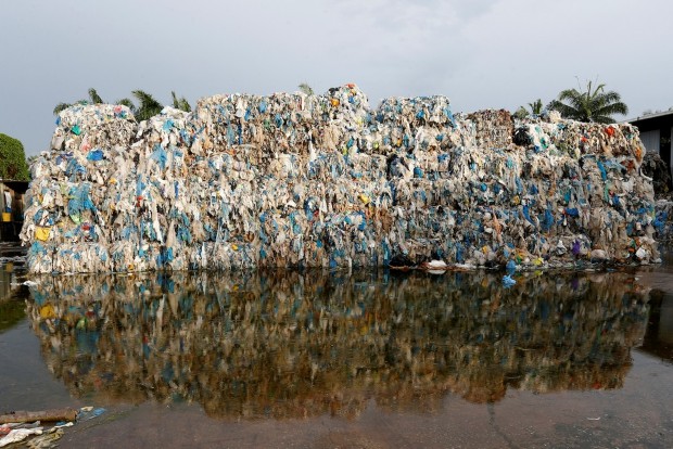 Plastic waste piled outside an illegal recycling factory in Jenjarom, Kuala Langat