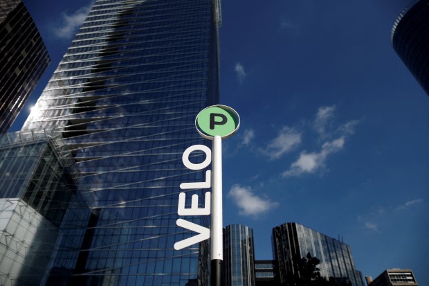 FILE PHOTO: A bike sign is pictured at the La Defense business district in Paris